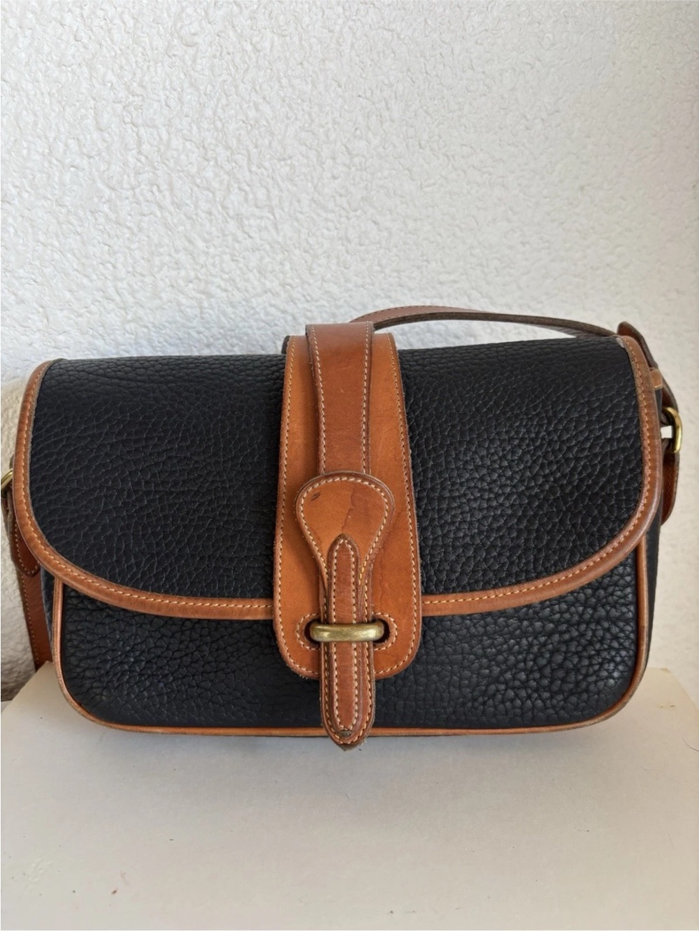 Dooney & Bourke Black Pebbled Leather Crossbody with Tan Trim